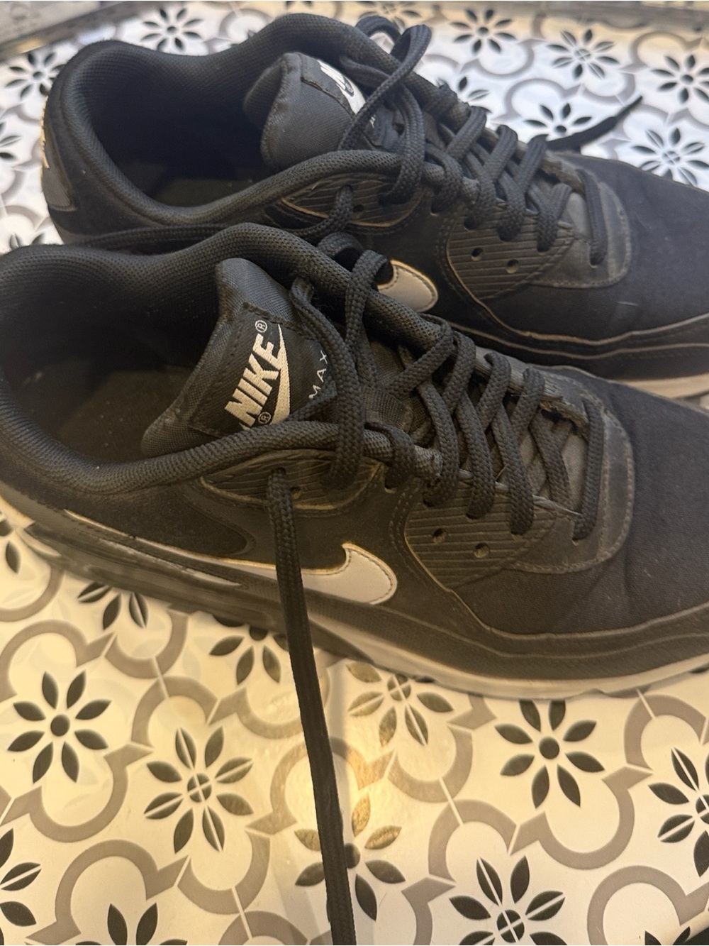 Women’s Nike Black Low-Top Sneakers with White Swoosh